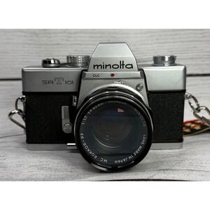 Minolta SRT 101 35mm SLR Film Camera with MC Rokkor-PF 55mm f1.7 Lens Silver